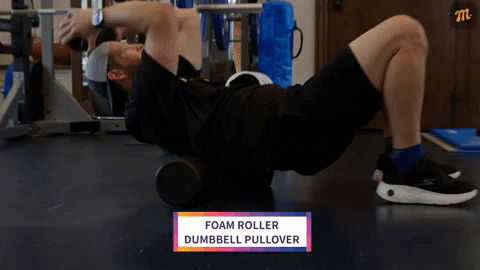 Clayton Kershaw performing foam roller dumbbell pullover